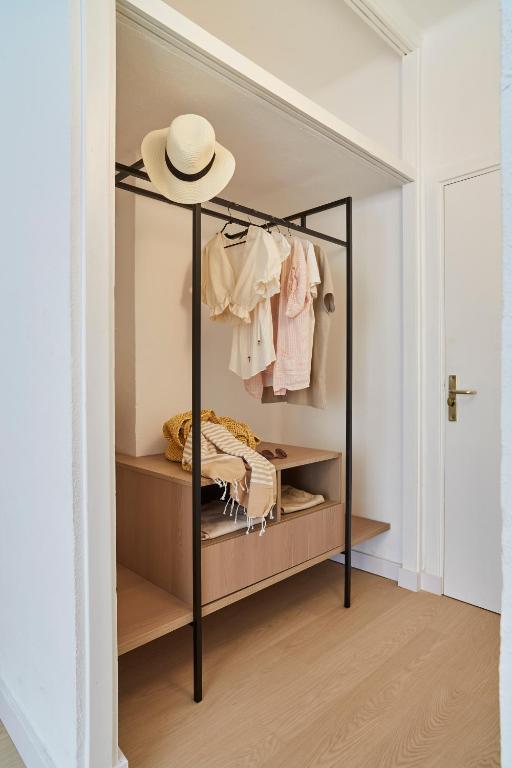 A bed or beds in a room at Excelsior Estudios & Apartamentos