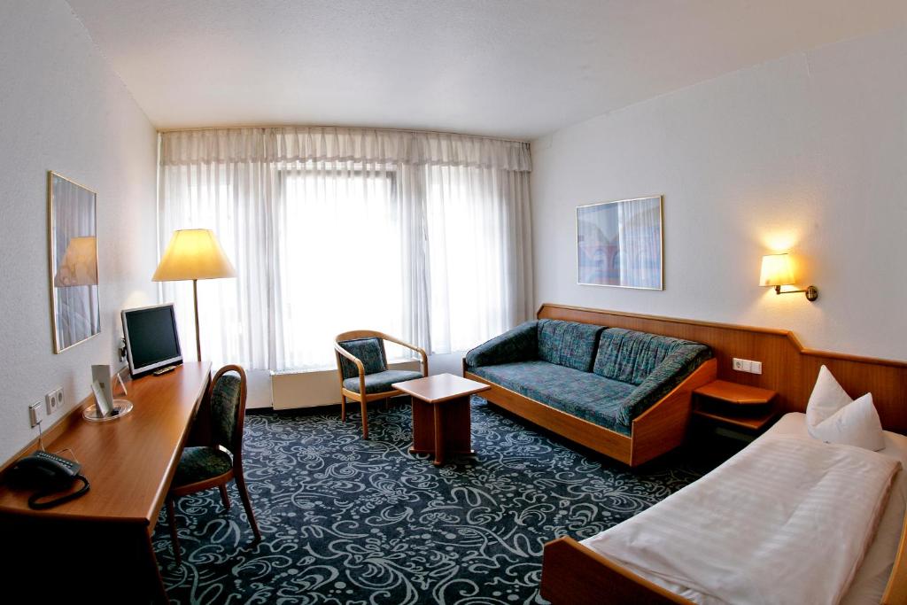 TV a/nebo společenská místnost v ubytování ALFA Hotel - Superior