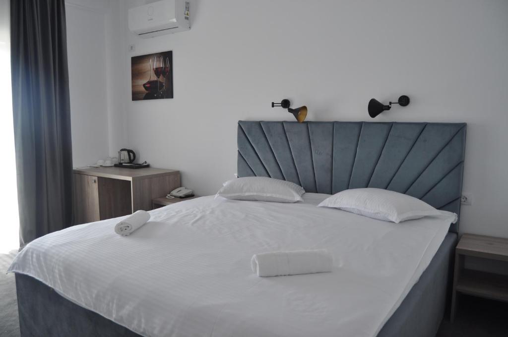 Postel nebo postele na pokoji v ubytování Hotel Maya