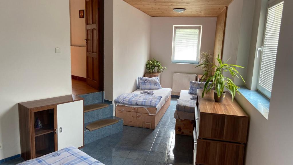 Postel nebo postele na pokoji v ubytování Penzion Bamako