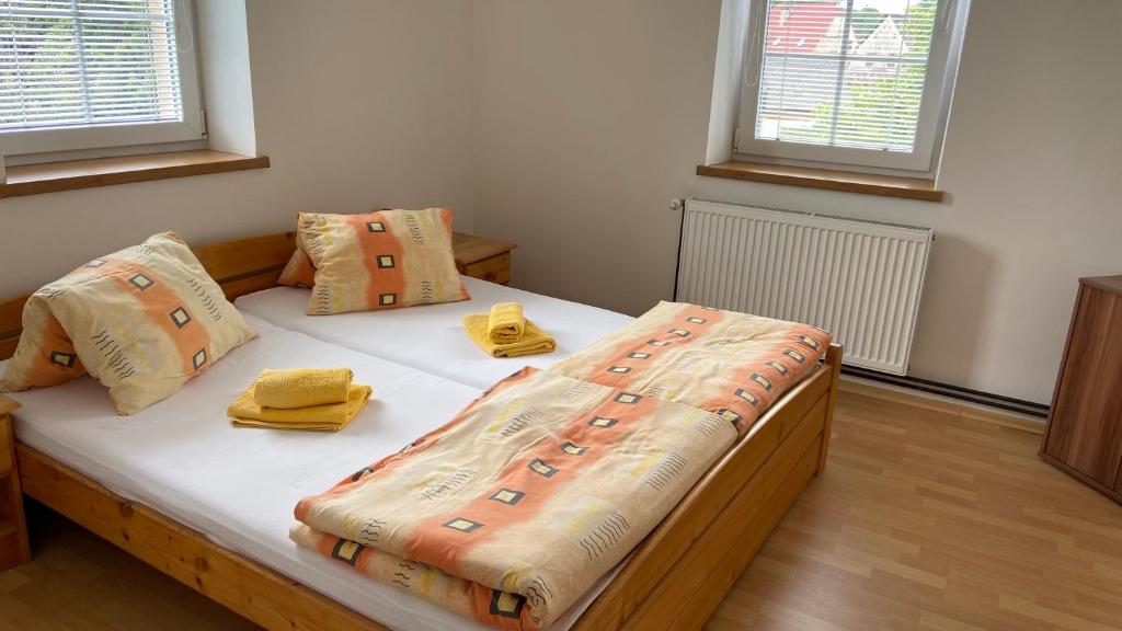 Postel nebo postele na pokoji v ubytování Penzion Bamako