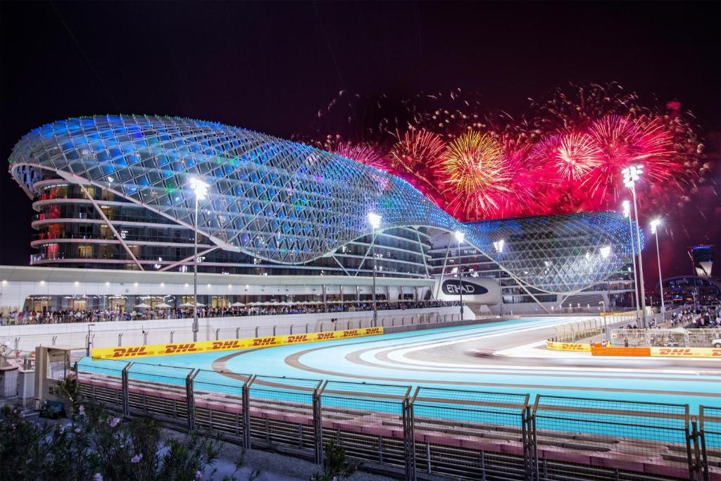 a view of a race track at night with fireworks at W Abu Dhabi - Yas Island in Abu Dhabi