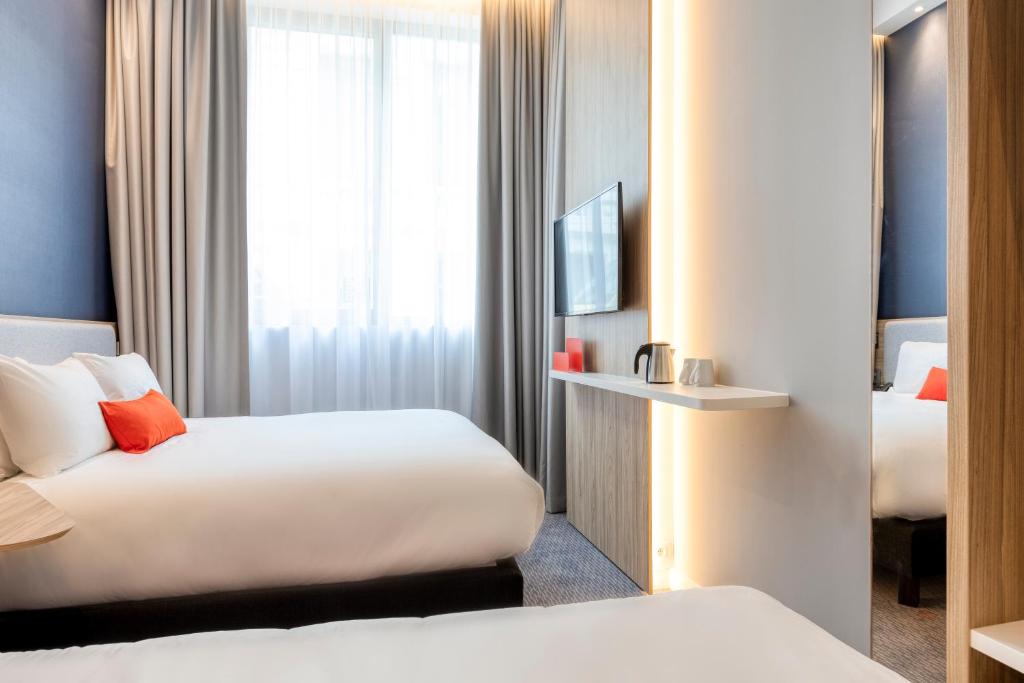 Postel nebo postele na pokoji v ubytování Holiday Inn Express Antwerp - City Centre by IHG