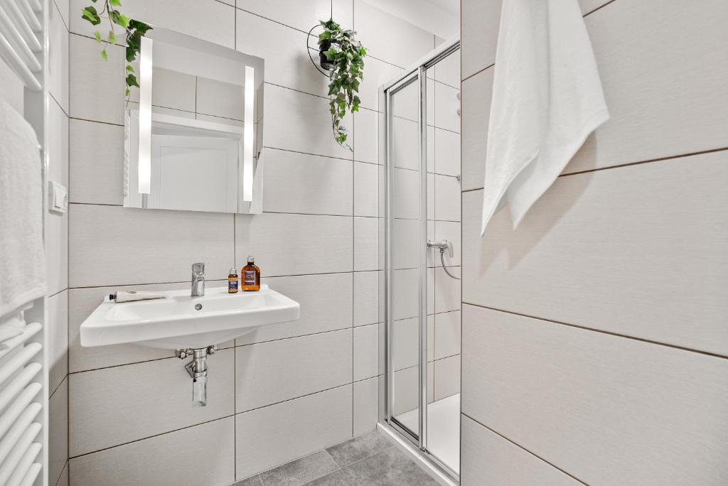 Koupelna v ubytování Enjoy Downtown Boutique Apartments #13 by Goodnite cz
