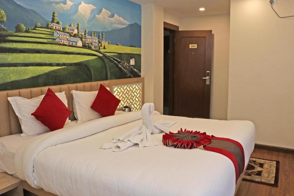 Postel nebo postele na pokoji v ubytování Hotel Malati