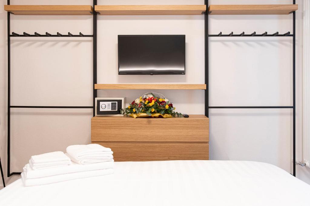 Postel nebo postele na pokoji v ubytování Hotel SALEI