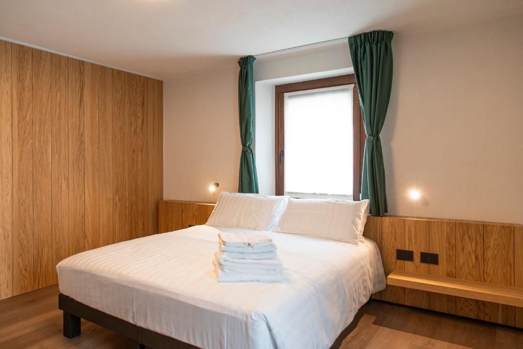 Postel nebo postele na pokoji v ubytování Hotel SALEI