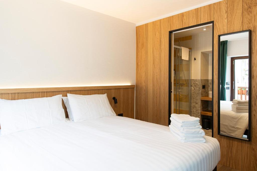 Postel nebo postele na pokoji v ubytování Hotel SALEI