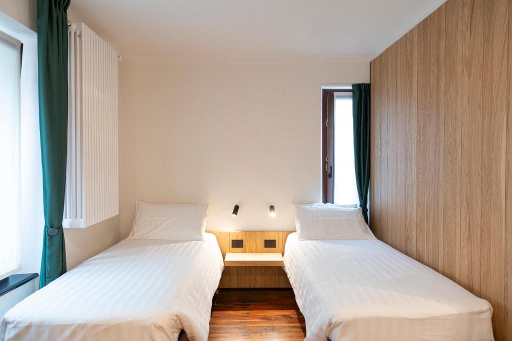 Postel nebo postele na pokoji v ubytování Hotel SALEI
