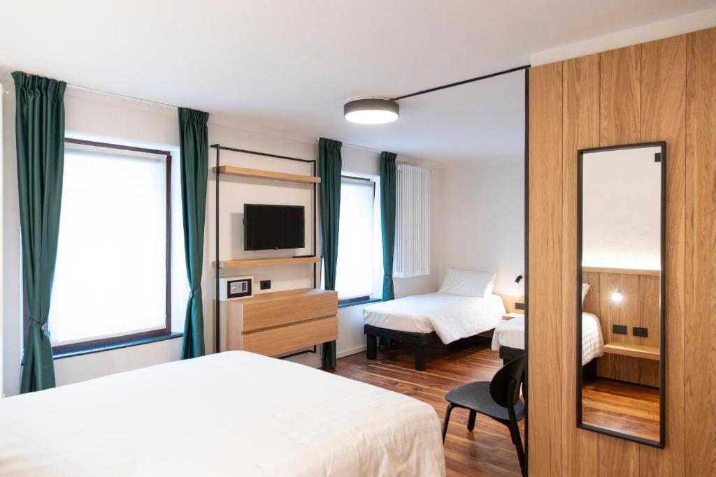 Postel nebo postele na pokoji v ubytování Hotel SALEI