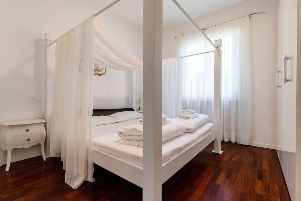 A bed or beds in a room at Casa Belvedere