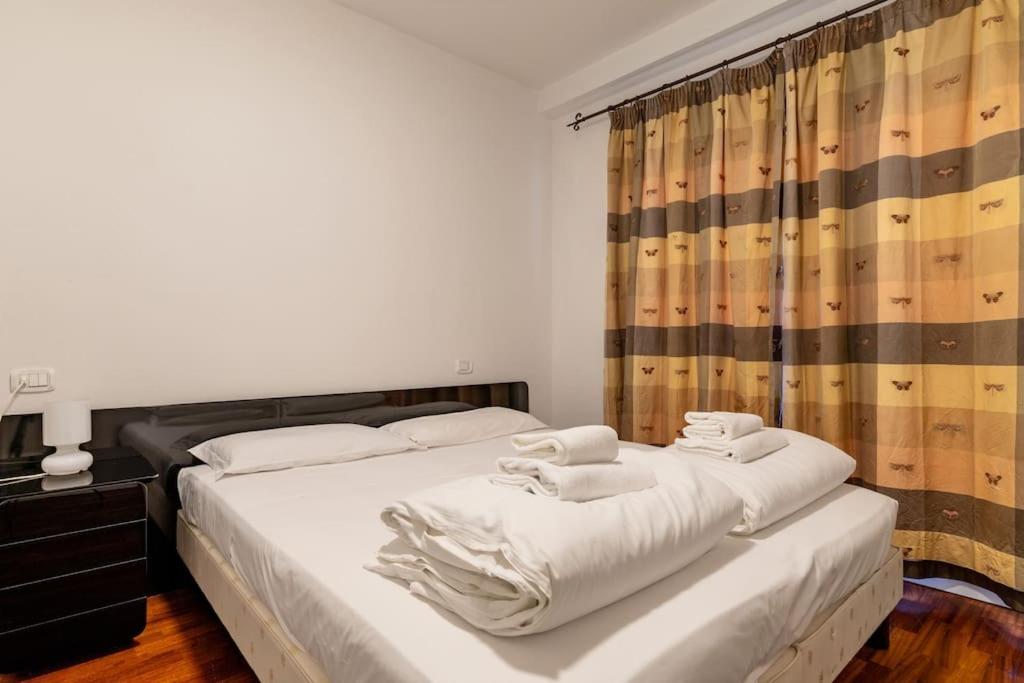 A bed or beds in a room at Casa Belvedere