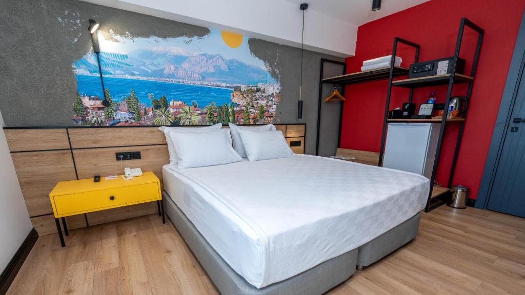 Postel nebo postele na pokoji v ubytování Just Inn City