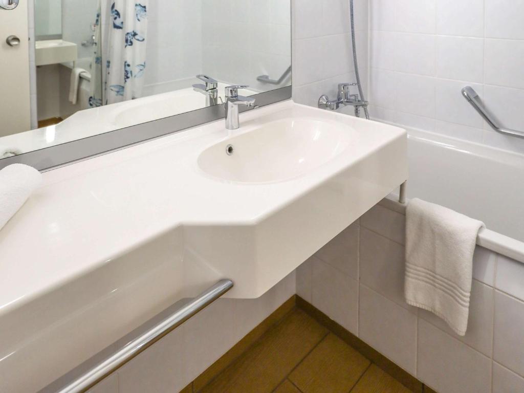 Kúpeľňa v ubytovaní Novotel Poznań Malta