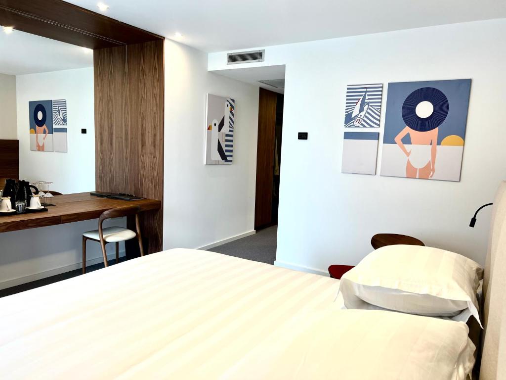 Postel nebo postele na pokoji v ubytování Boutique Hotel Mirjam
