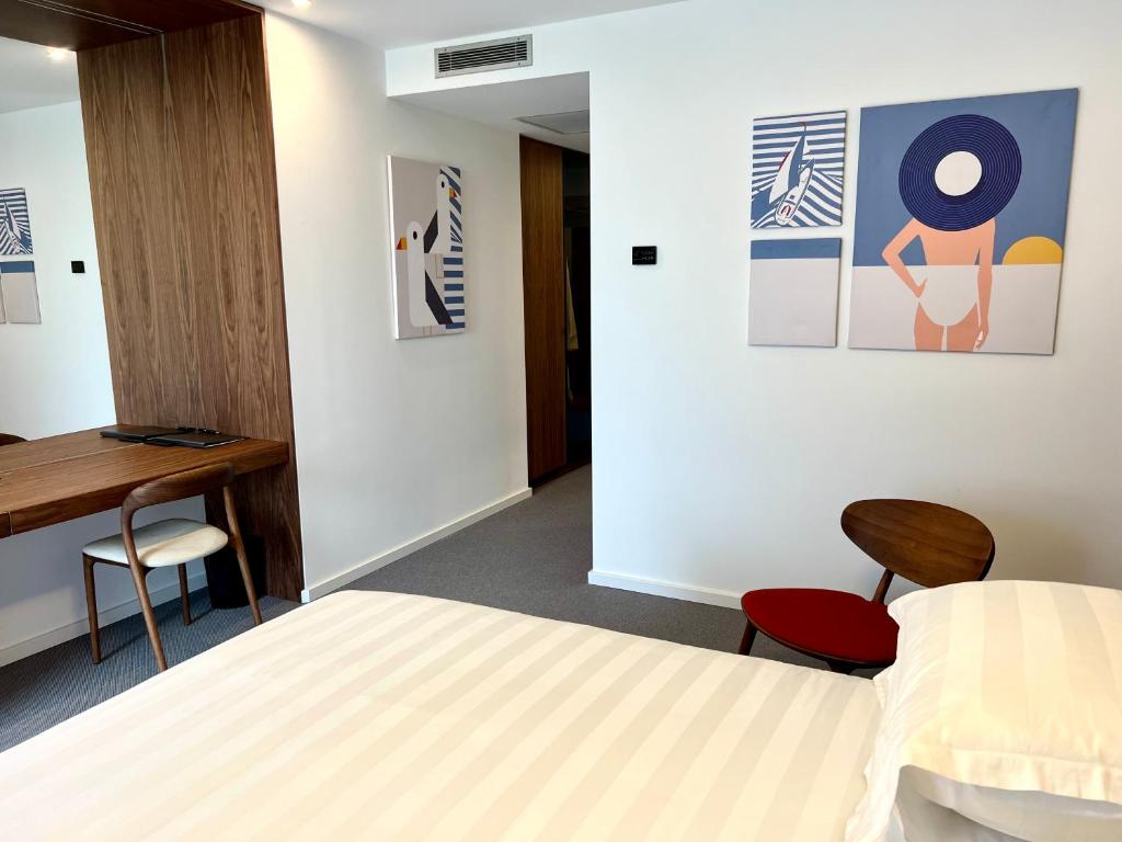 Postel nebo postele na pokoji v ubytování Boutique Hotel Mirjam