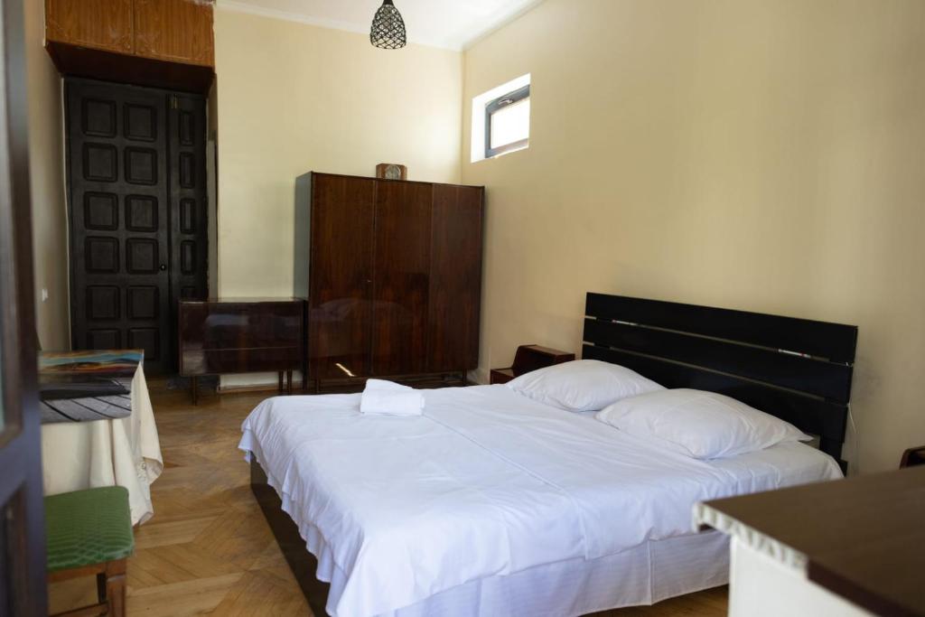Postel nebo postele na pokoji v ubytování Wine House