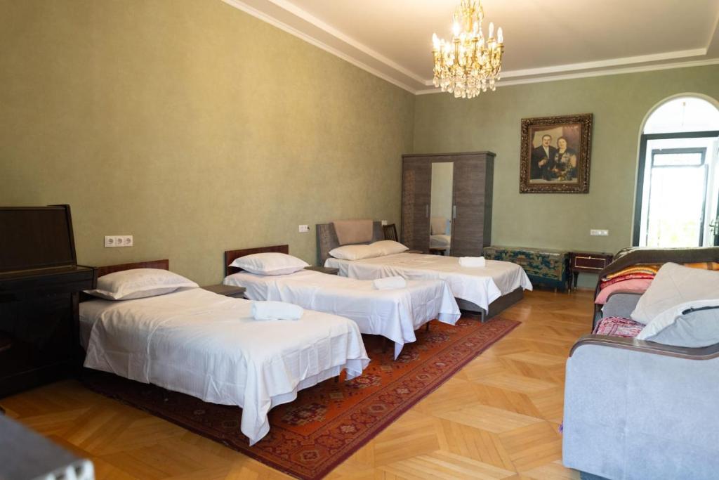 Postel nebo postele na pokoji v ubytování Wine House