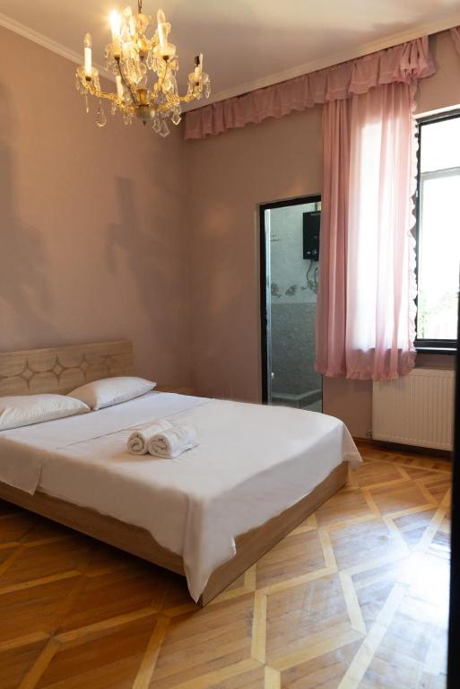 Postel nebo postele na pokoji v ubytování Wine House