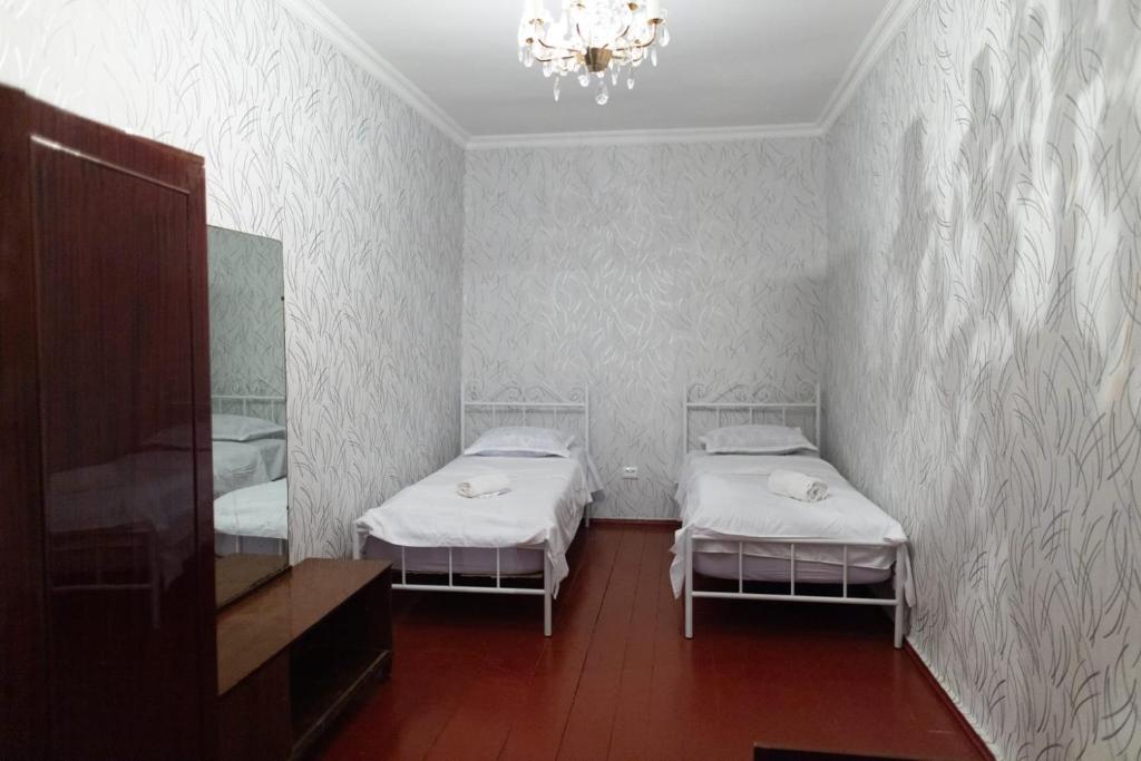 Postel nebo postele na pokoji v ubytování Wine House