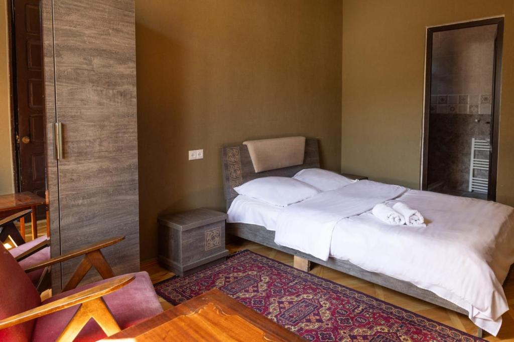 Postel nebo postele na pokoji v ubytování Wine House