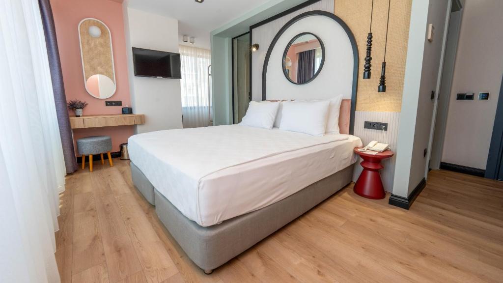 Postel nebo postele na pokoji v ubytování Just Inn City