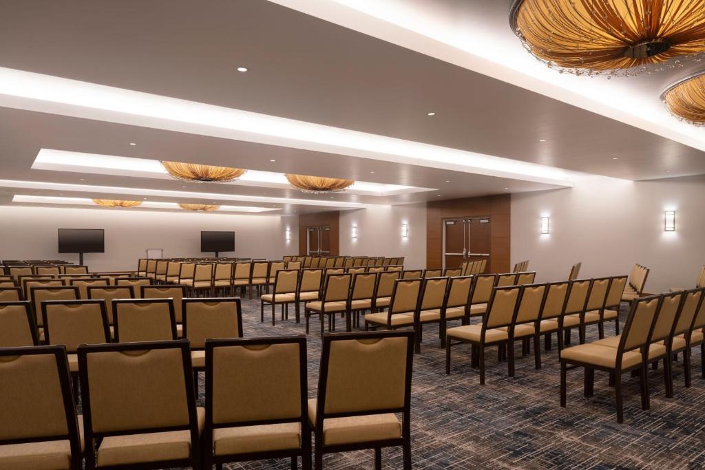 a large room with rows of chairs in it at The Ritz-Carlton, Los Angeles L.A. Live in Los Angeles