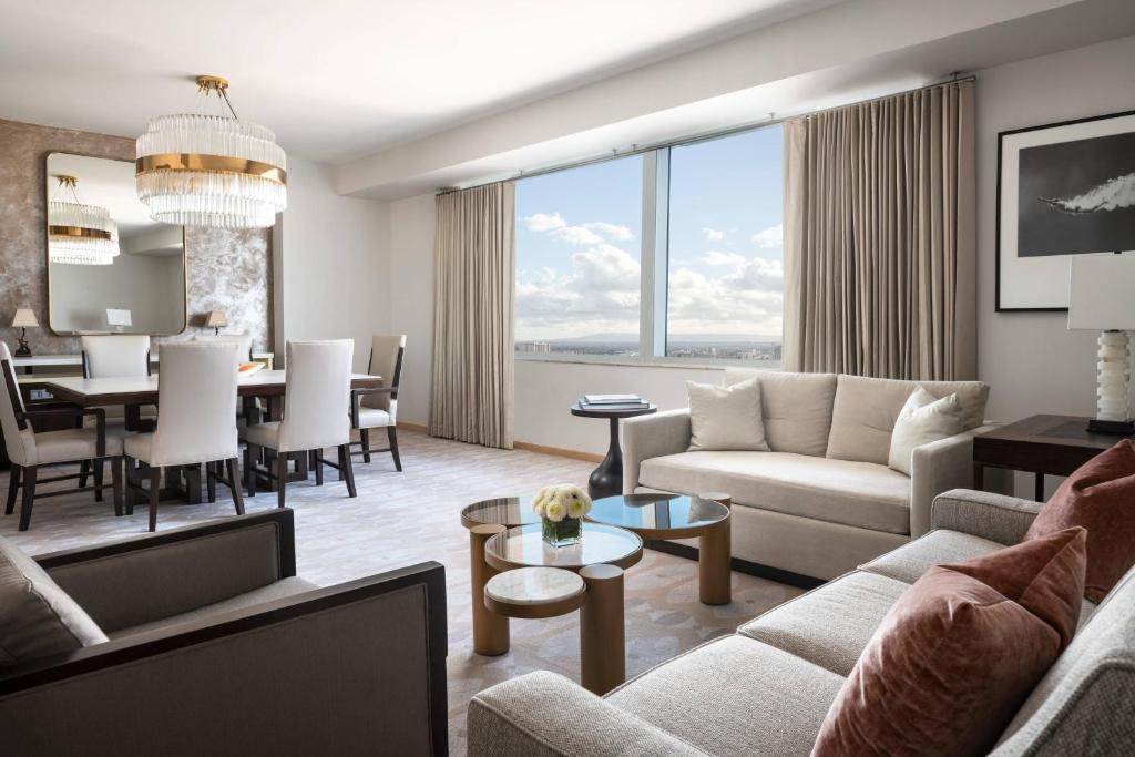 a living room with a couch and a table at The Ritz-Carlton, Los Angeles L.A. Live in Los Angeles