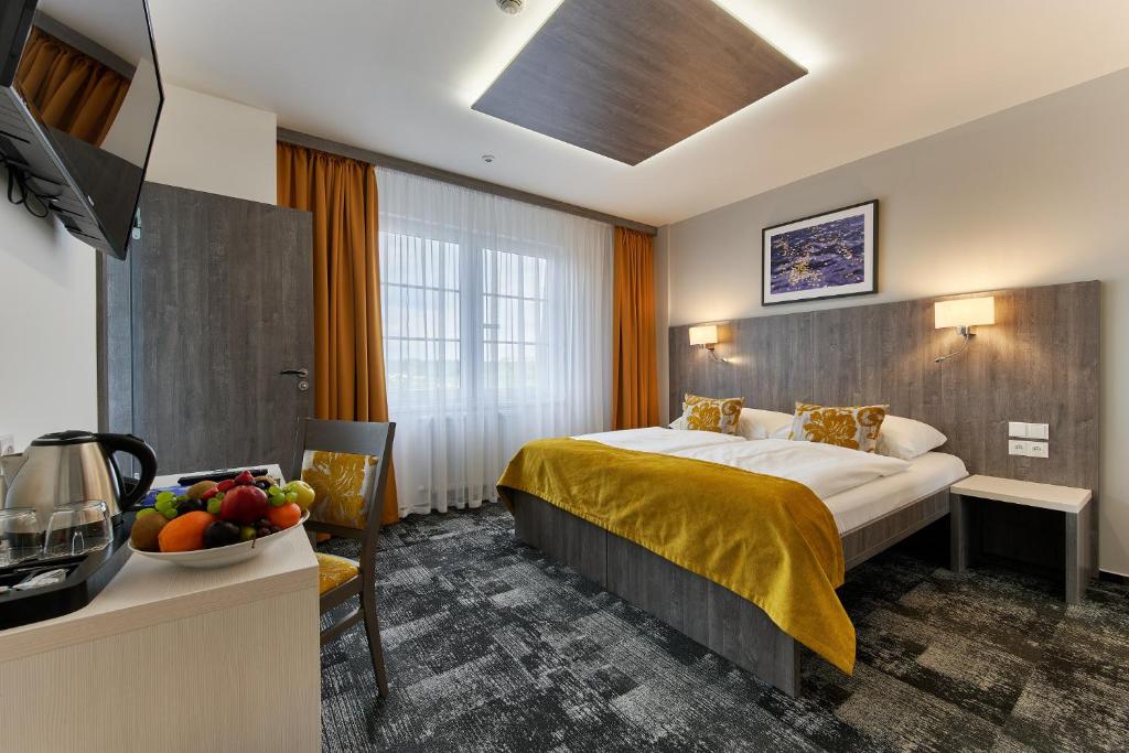 Wellness Hotel Step - Czech Leading Hotels客房内的一张或多张床位