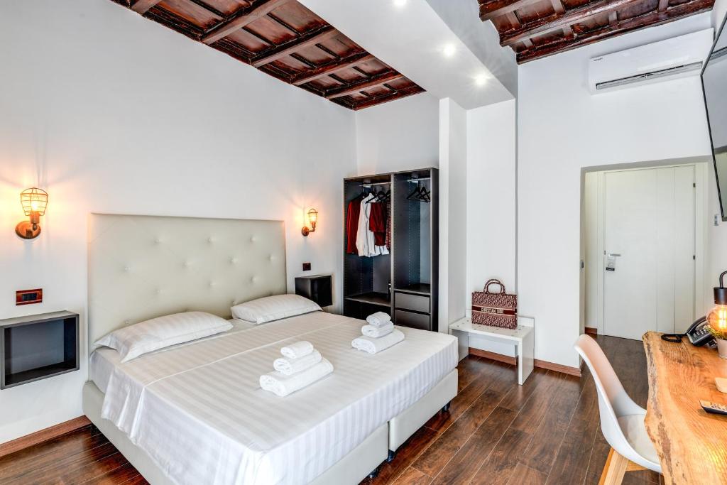 Кровать или кровати в номере Effe Luxury Palace