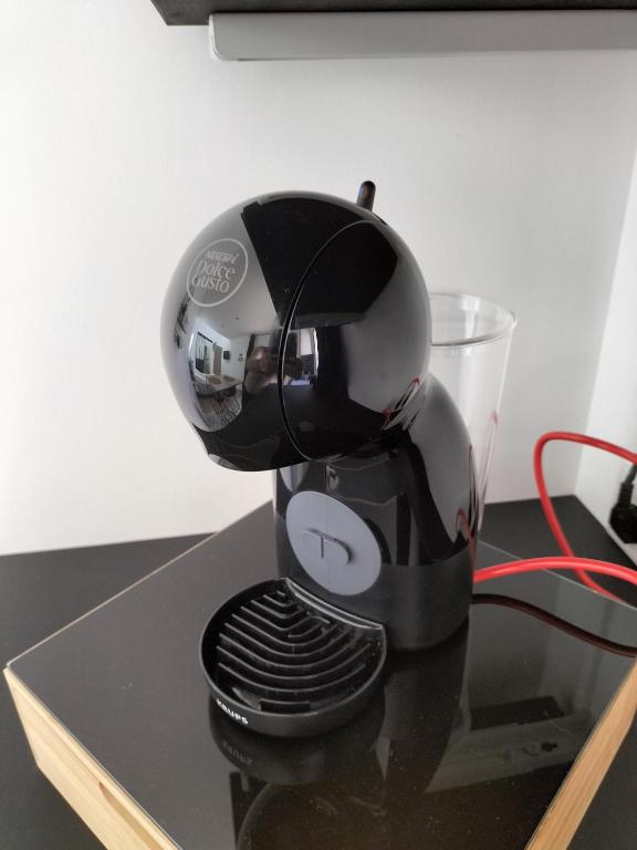 Příslušenství pro přípravu čaje a kávy v ubytování Studio - Au fond de la cour