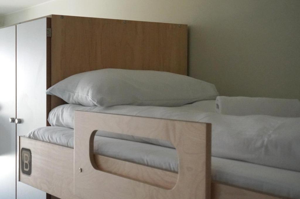 Postel nebo postele na pokoji v ubytování Rumi Hostel