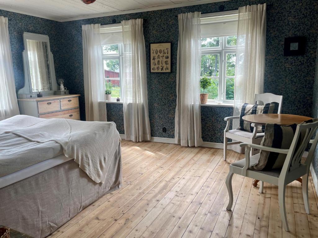 Postel nebo postele na pokoji v ubytování Gårdsfrun B&B