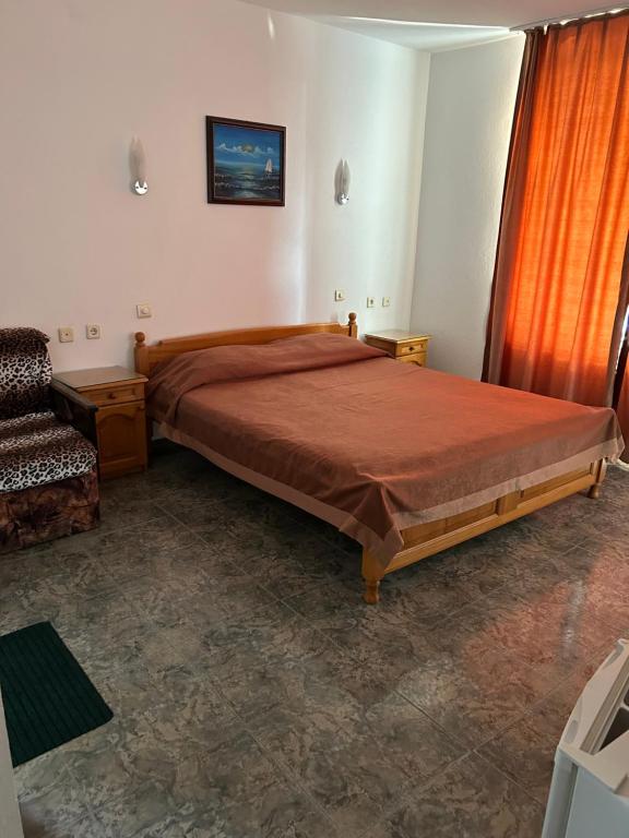 Postel nebo postele na pokoji v ubytování КЪЩА"Перла"