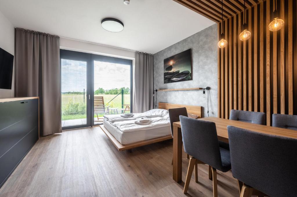 Łóżko lub łóżka w pokoju w obiekcie RELAX PARK Třeboň II