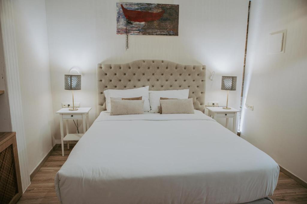 Posteľ alebo postele v izbe v ubytovaní Porta Medina Boutique Hotel