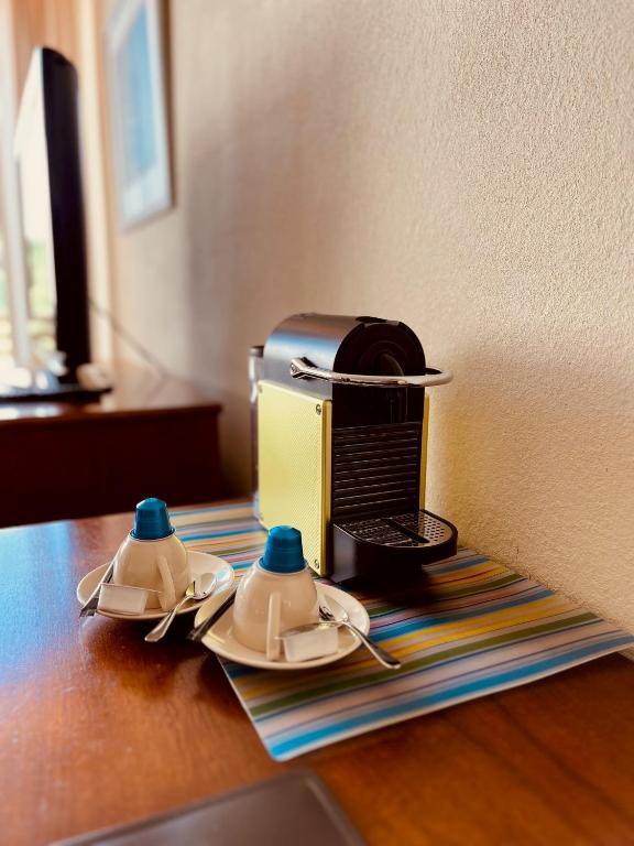 Příslušenství pro přípravu čaje a kávy v ubytování Hotel Sonnenberg Garni