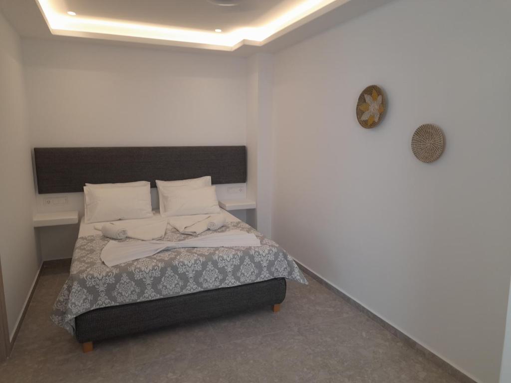 Postel nebo postele na pokoji v ubytování Sand rooms Antiparos