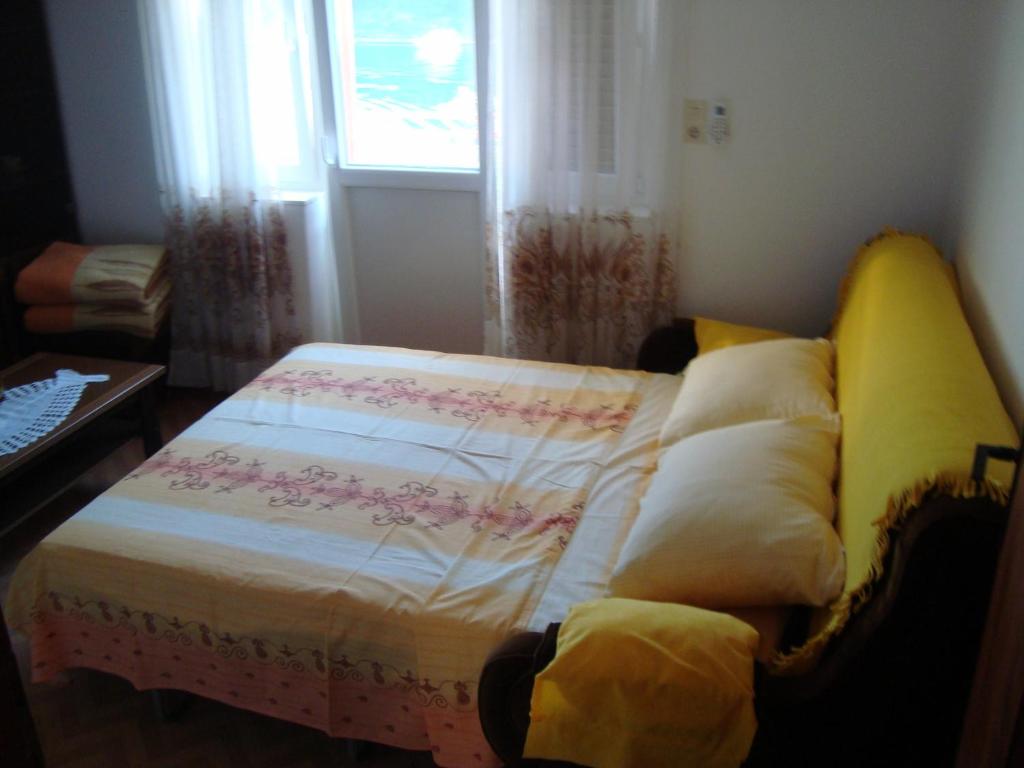 Postel nebo postele na pokoji v ubytování Apartment Josipa