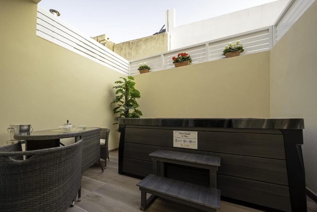 Posezení v ubytování Domus Boutique Hotel