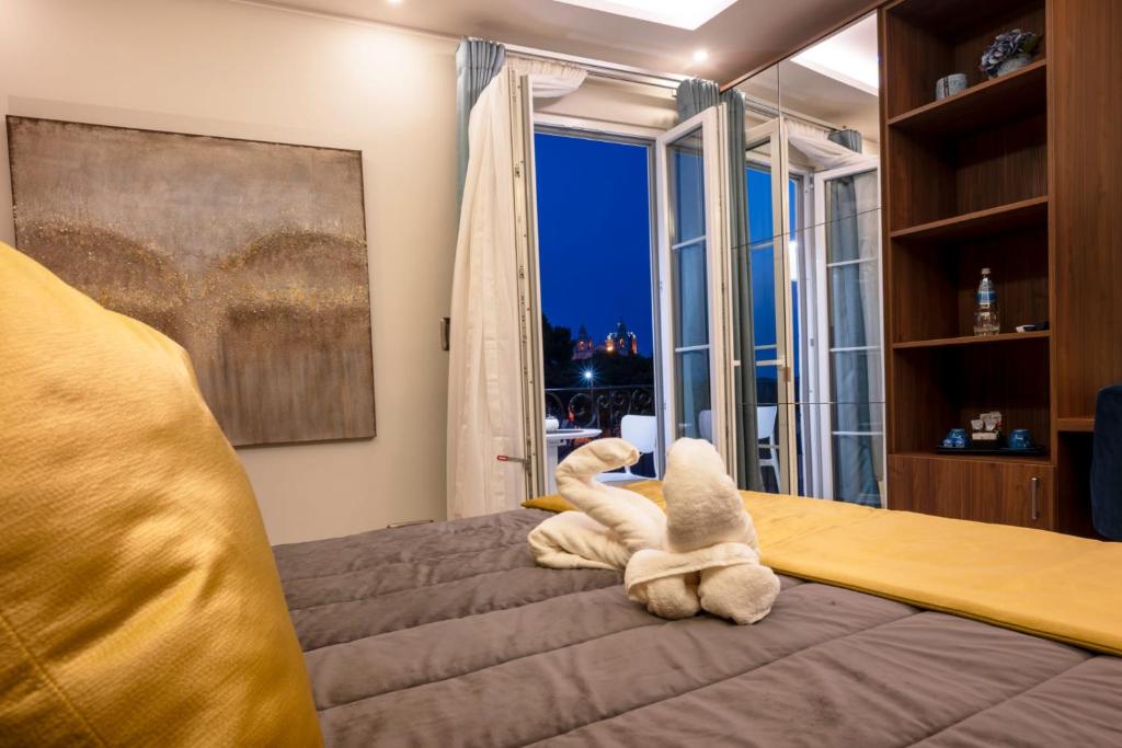 Postel nebo postele na pokoji v ubytování Domus Boutique Hotel