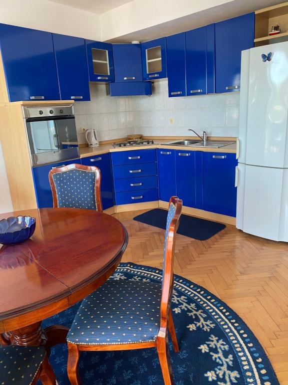 Kuchyň nebo kuchyňský kout v ubytování Apartments Grifone Lux