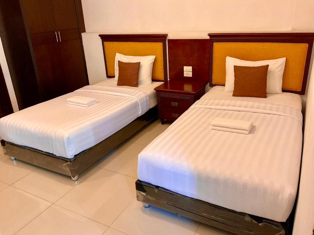 Postel nebo postele na pokoji v ubytování Sota Residence