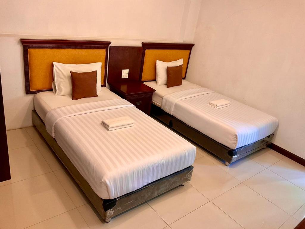 Postel nebo postele na pokoji v ubytování Sota Residence