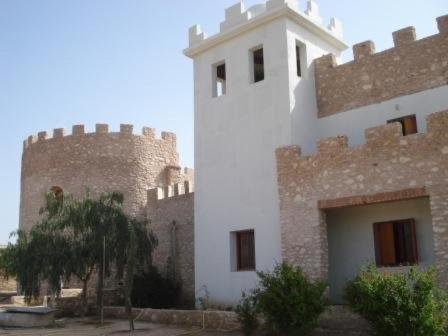 a castle with two towers and a building at CHATEAU D'ORIENT in Essaouira