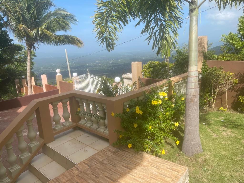 a balcony with a view of the ocean at Chateau la Mel in Mandeville