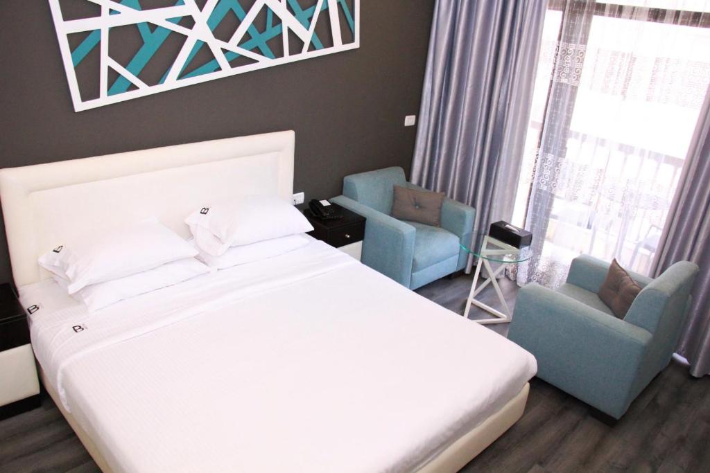 Postel nebo postele na pokoji v ubytování Beverly Hotel Beirut