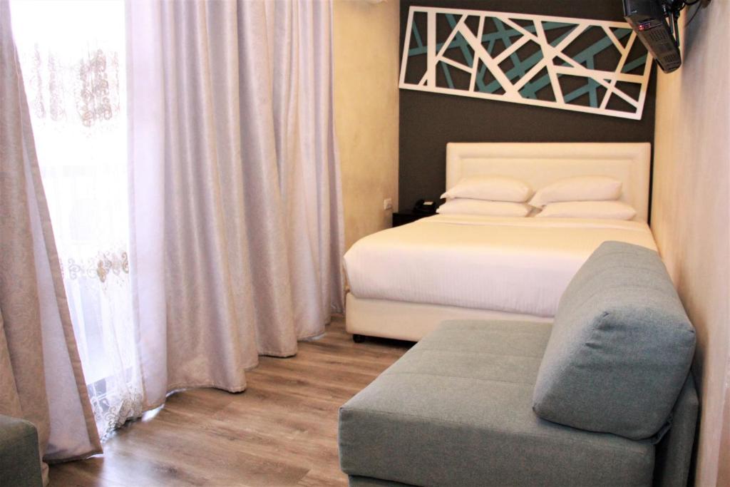 Postel nebo postele na pokoji v ubytování Beverly Hotel Beirut
