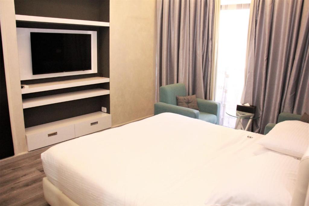 Postel nebo postele na pokoji v ubytování Beverly Hotel Beirut