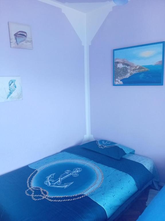 Llit o llits en una habitació de Guest House Cinderella